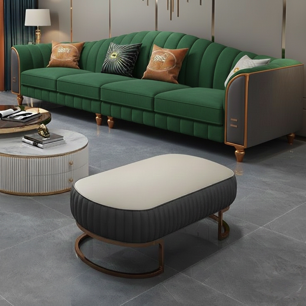 Emerald green luxury sofa with gold trim and plush cushions placed in a premium living room.