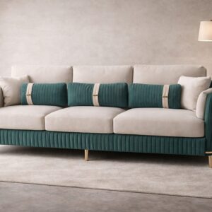 Teal and beige upholstered sofa with matching teal ribbed cushions and gold metal legs.
