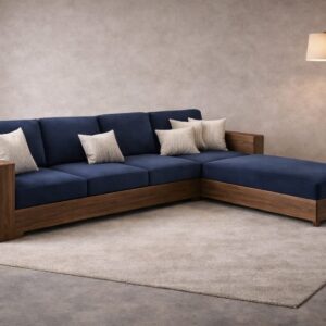Royal Blue L-shaped wooden sectional sofa with striped cushions in a bright modern living room with large windows.