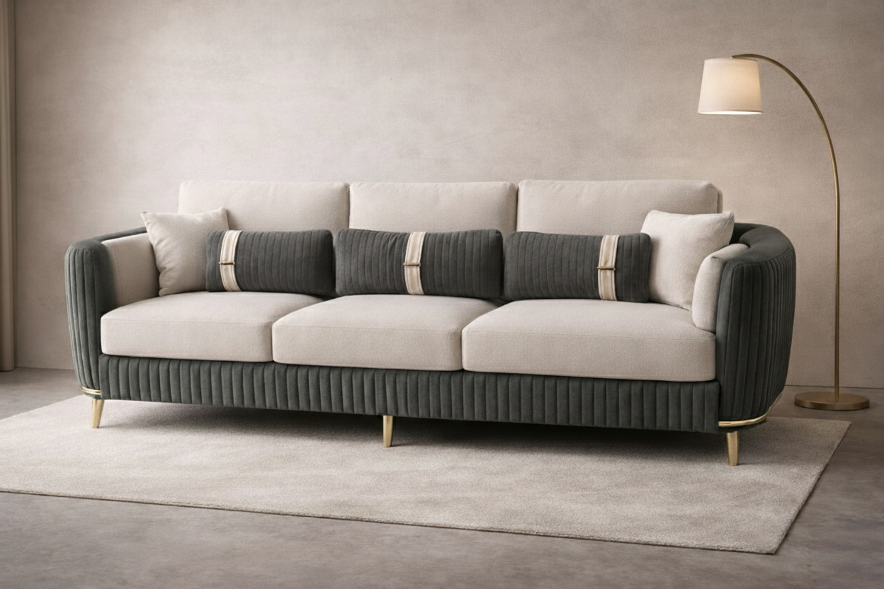 This grey velvet L-shaped sectional sofa delivers a sleek, modern aesthetic with superior comfort. Gold-finished legs elevate its contemporary appeal, while the matching ottomans add style and functionality—ideal for minimalist and luxury-themed interiors alike.