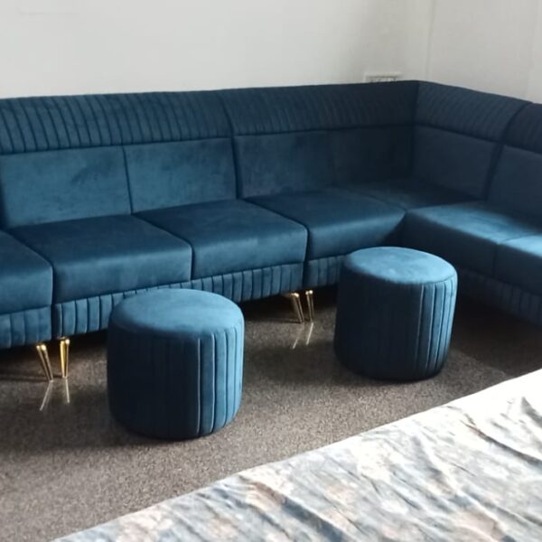 Lorencia Luxe Modular Velvet Sofa in teal by Turtle Vine Interiors