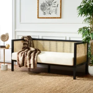 Seren Noir Cane Day Lounger with black wood frame and cane panels by Turtle Vine Interiors