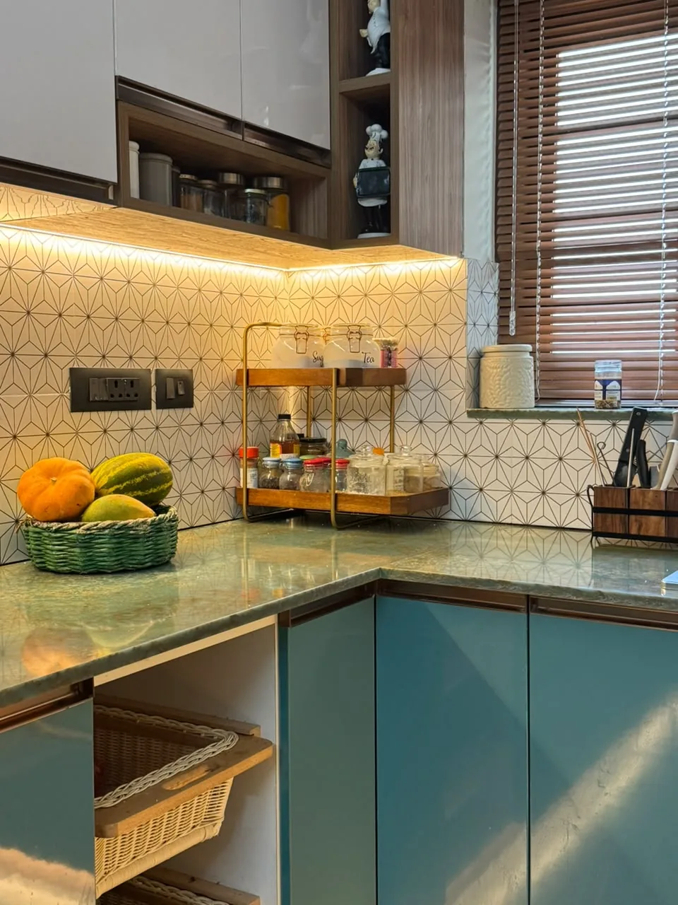 Wicker pull-out basket storage in the base units of a modular kitchen